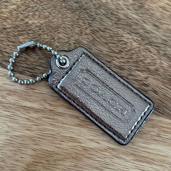 Metallic silver - Coach Stamped Leather Hang Tag - Picture 1 of 2